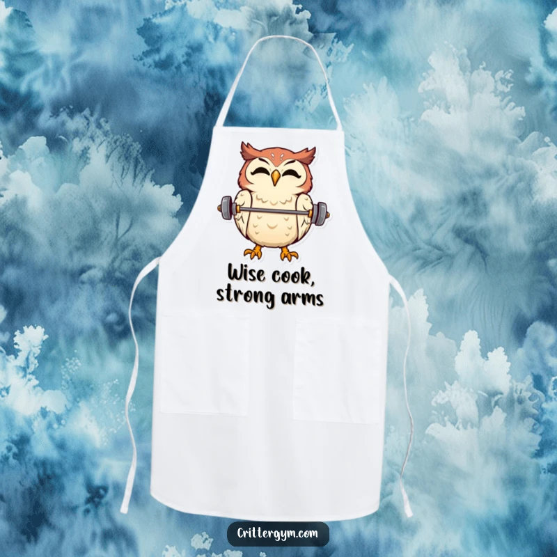Funny cooking apron featuring an overjoyed owl balancing a tiny barbell on its beak, perfect for kitchen wisdom.