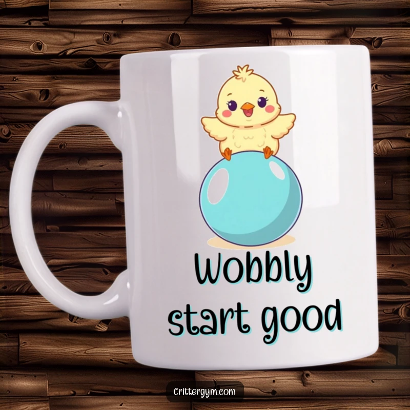 Funny small fluffy chick character balancing on a yoga ball, wobbling with delight on a ceramic mug, a great funny gift.