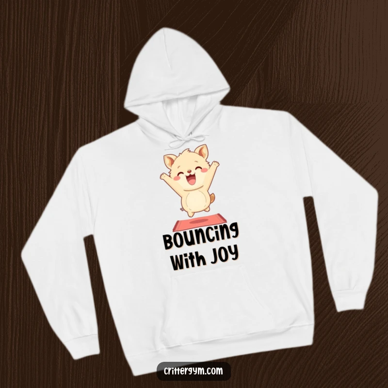 Funny Hoodie: A fluffy animal character grins widely while energetically bouncing on a small yoga mat, showcasing humor.