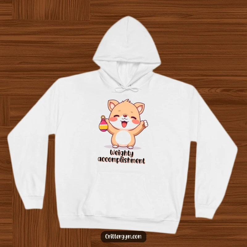 Funny Hoodie: A cute creature cheering joyfully while holding a small, colorful weight.