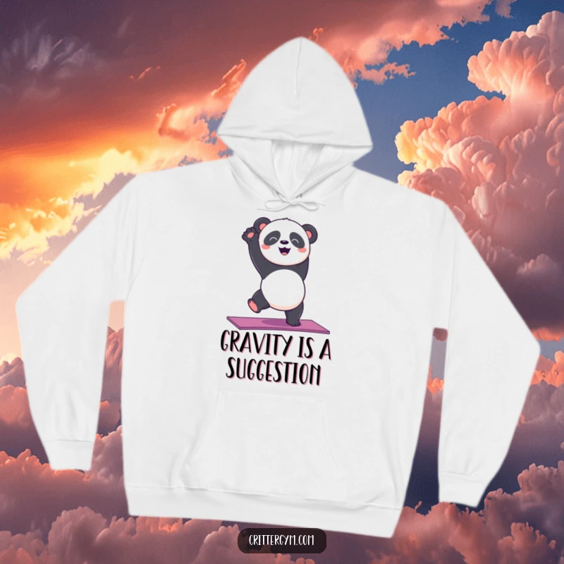 Funny, cheerful panda bear attempting a handstand on a yoga mat, looking determined yet wobbly on a cozy hoodie.