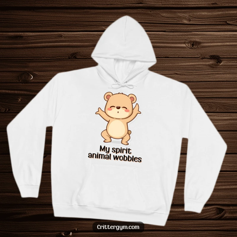 Funny Yoga Bear Hoodie: A determined bear hilariously attempts a yoga pose, wobbling in this cozy, humorous apparel.