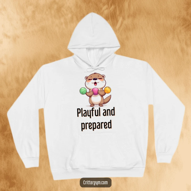 Funny winking otter juggling exercise balls on a soft hoodie, ideal for a funny present.
