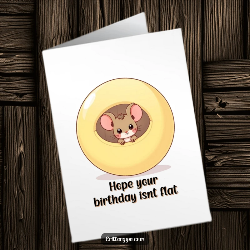 Funny Free Printable Birthday Card: A small mouse peeking out from a large, deflated exercise ball, looking curious and surprised.