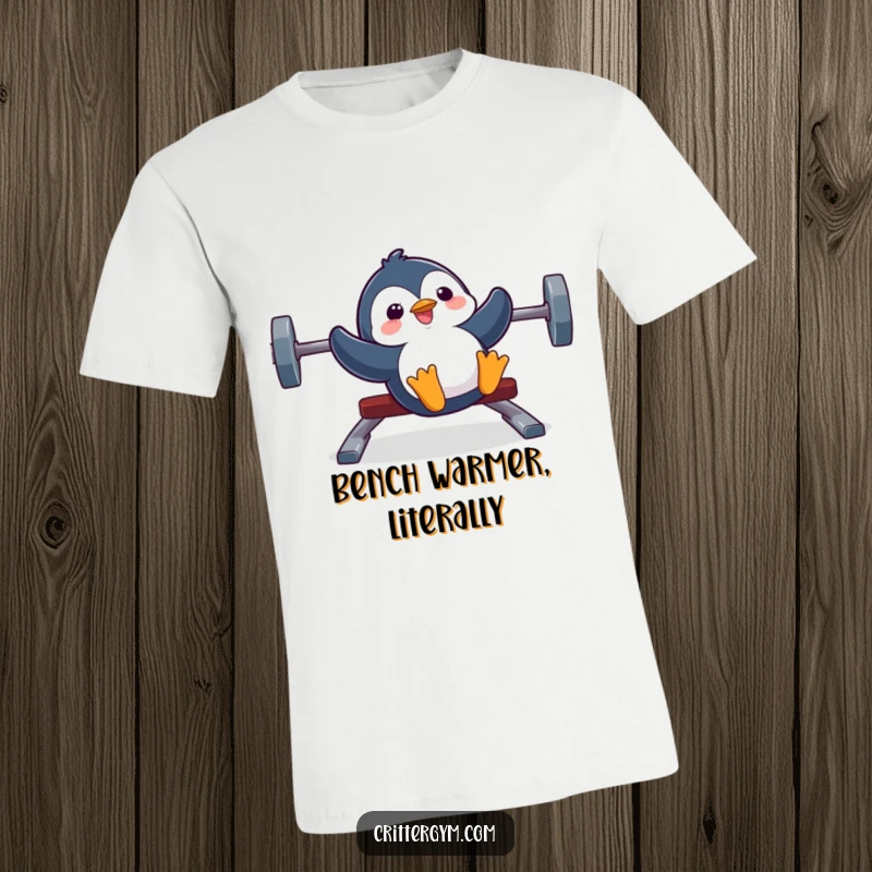 Funny t-shirt showcasing a silly penguin gleefully sliding down a weight bench, expressing pure, unadulterated joy.