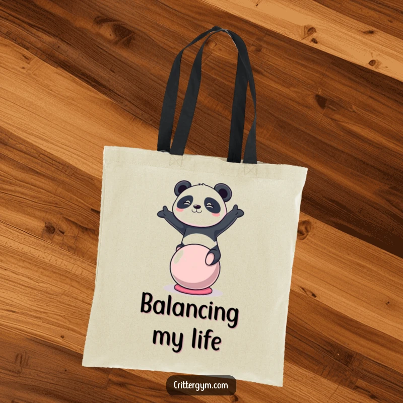 Funny kawaii panda character balancing on a yoga ball on a durable tote bag, a stylish funny gift.