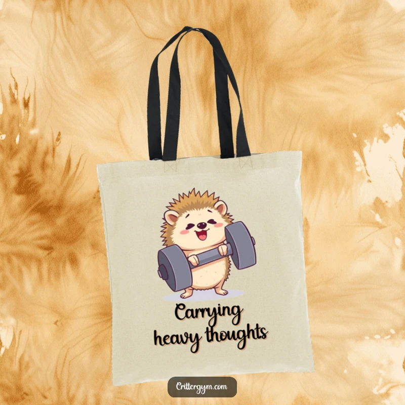 Funny determined hedgehog tote bag lifting a comically large dumbbell, symbolizing strength and effort, excellent for gym enthusiasts and a funny gift.